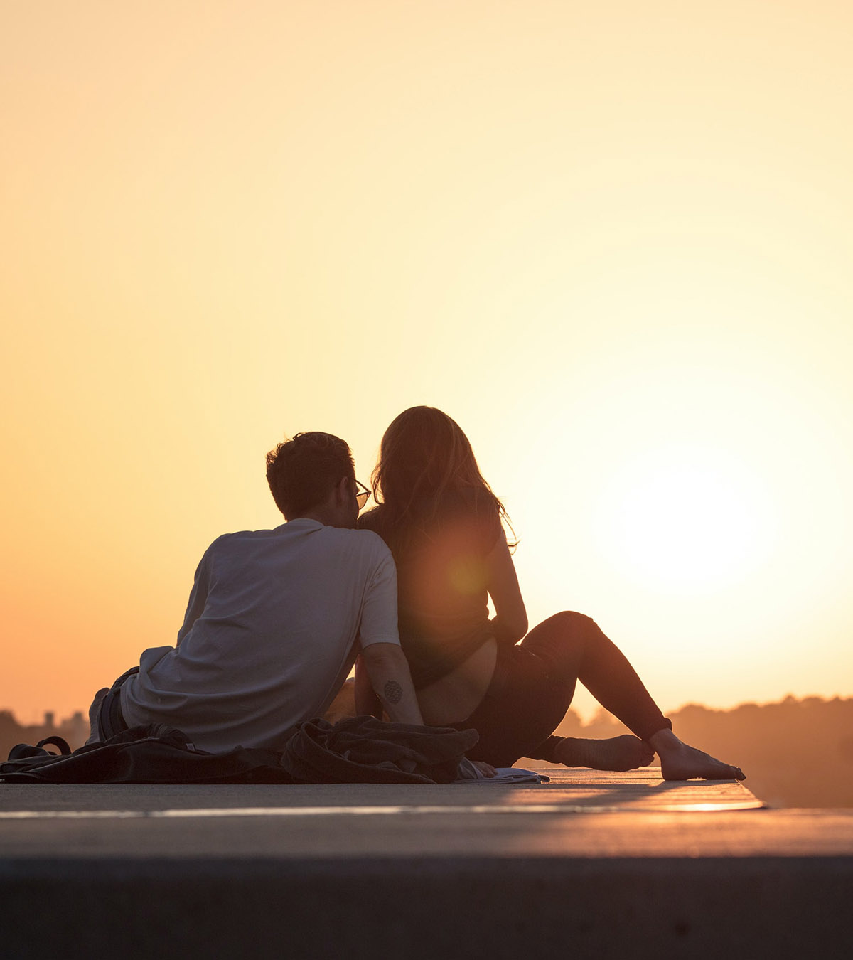 photo of a couple at sunset after practicing Gottman Method Couples therapy