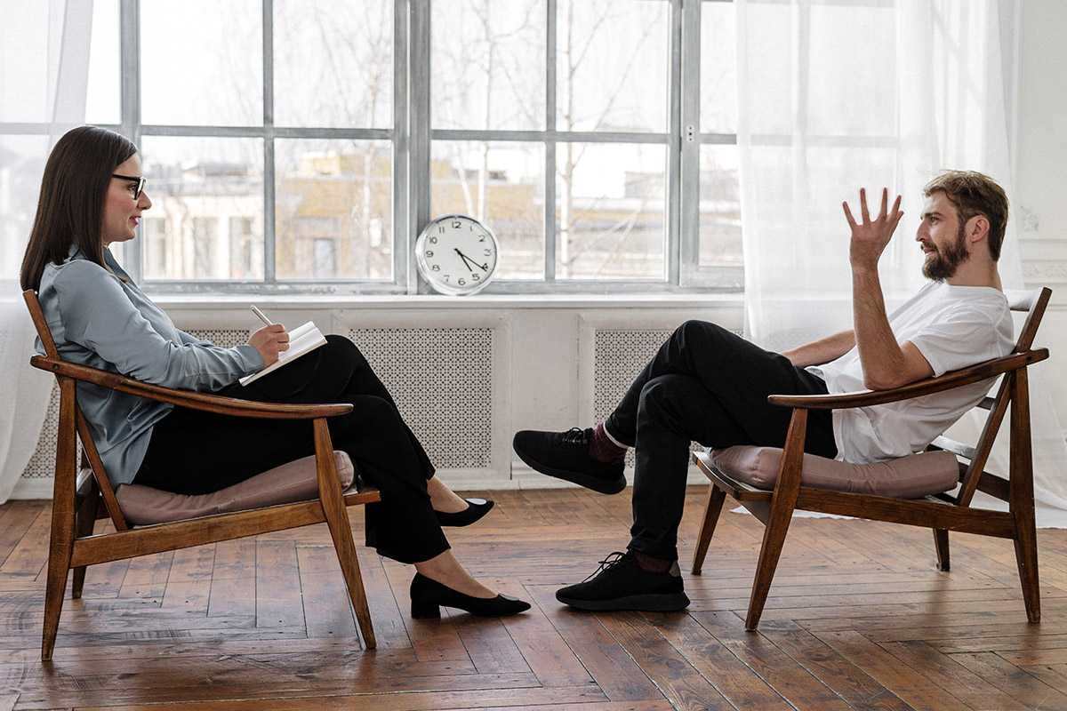 photo of a person and counselor during an individual therapy session